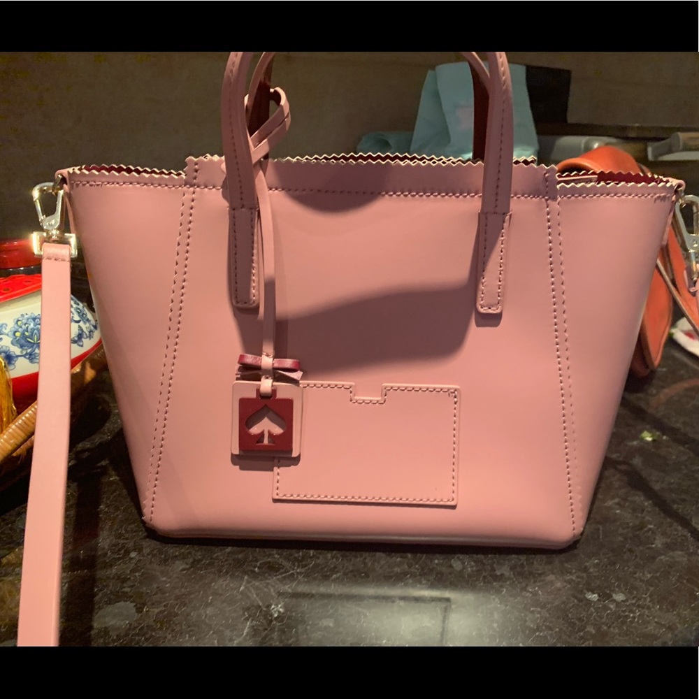 Brand new tire back by Kate Spade